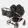 Junama Diamond S-Line Duo V3 – Zwillings-Kinderwagen 4-in-1-Set mit. 2 Babywannen, 2 Sportsitze, 2x Babyschale Avionaut Cosmo 2.0 Smart und 2x Basisstation Dock 2 – Black / in Rosegold – Ansicht 1
